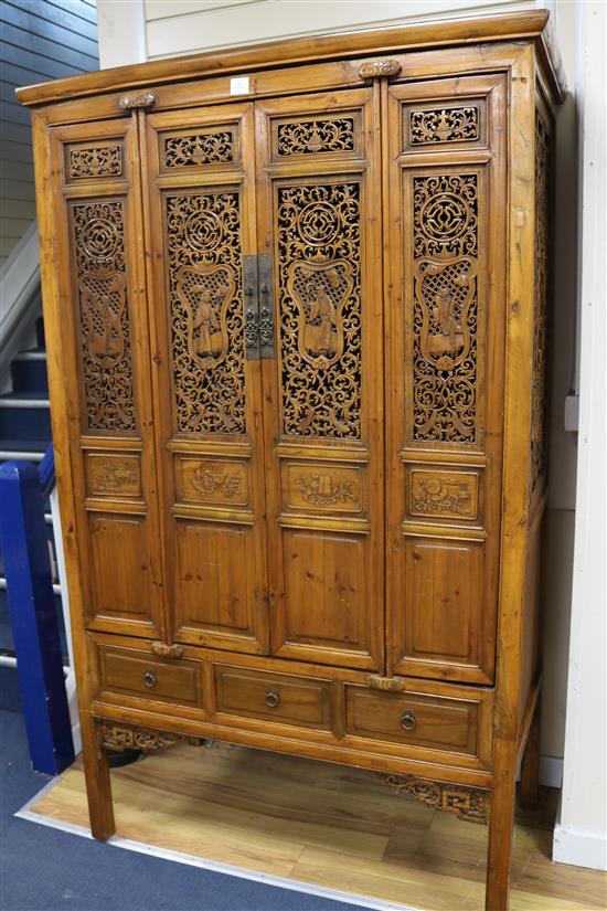 A Chinese yellow wood cabinet, 19th century W.117cm